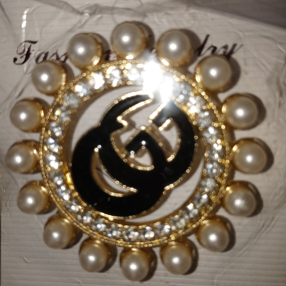 Inspired brooch